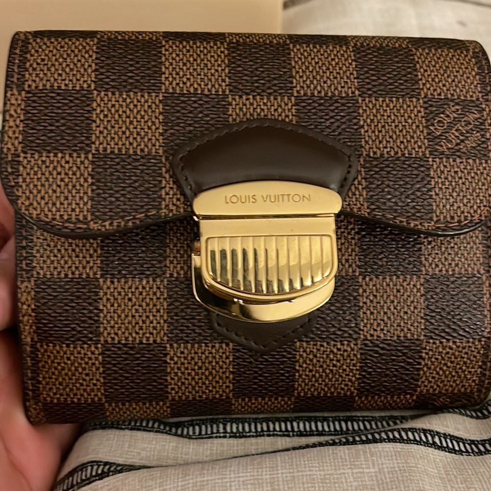 Authentic Louis Vuitton Joey Damier Ebene tri fold wallet.